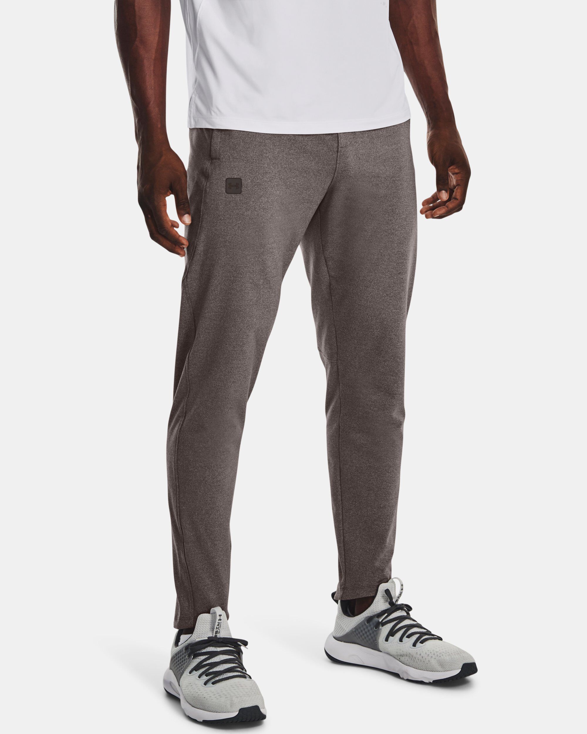Under armour men's tapered pants deals